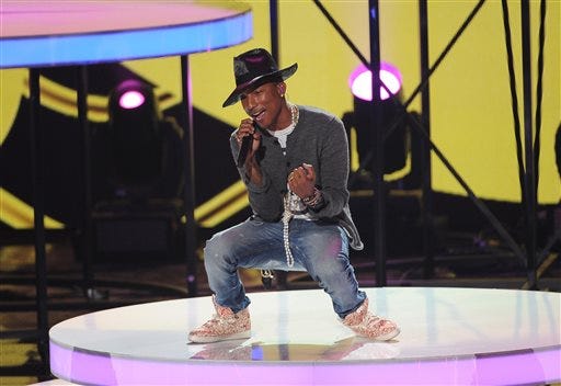 Pharrell Williams performs at the iHeartRadio Music Awards at the Shrine Auditorium on Thursday, May 1, 2014, in Los Angeles. (Photo by Chris Pizzello/Invision/AP)