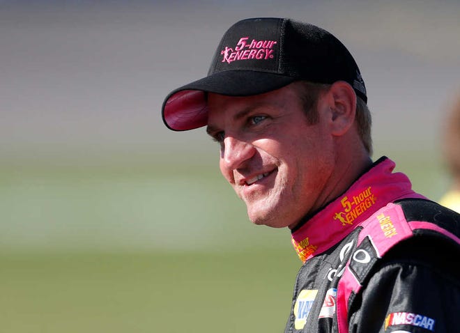 Clint Bowyer is heading home to Kansas Speedway this weekend with a new wife, a baby on the way and now a three-year contract extension that will keep him with Michael Waltrip Racing. The team announced the deal Monday, a day after Bowyer drove his No. 15 Toyota to a third-place finish at Talladega.