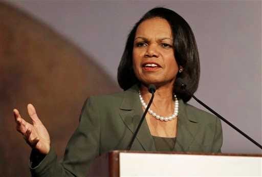 FILE - In this March 15, 2014 file photo, former Secretary of State Condoleezza Rice peaks at the California Republican Party 2014 Spring Convention in Burlingame, Calif. Rice has decided against delivering the commencement address at Rutgers University following protests by some faculty and students over her role in the Iraq War. Rice said in a statement Saturday, May 3, 2014 that she informed Rutgers President Robert Barchi that she was declining the invitation. She said her involvement had "become a distraction for the university community" at a "time of joyous celebration for the graduates and their families."(AP Photo/Ben Margot, File)