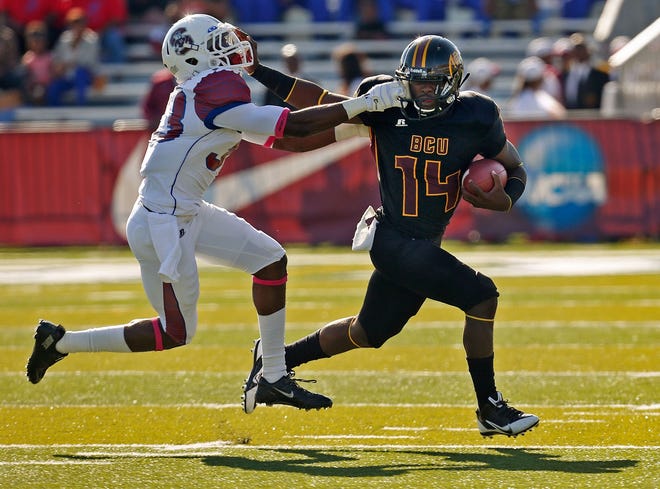 Bethune-Cookman quarterback Quentin Williams (14) and the Wildcats now have five home games at Municiapal Stadium.
