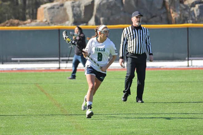 Former Portsmouth High School lacrosse star Emily Whitney has translated her skills to the college game, earning Rookie of the Year honors for Endicott College in the Commonwealth Coast Conference.