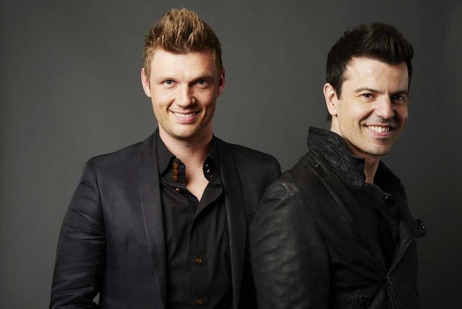 New Kid On The Block's Jordan Knight, right, and Backstreet Boy's Nick Carter pose for a portrait in promotion of their upcoming album "Nick and Knight", on Wednesday, April 30, 2014 in New York. (Photo by Dan Hallman/Invision/AP)