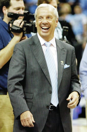 MEMPHIS, TN - MARCH 29: Head coach Roy Williams of the North Carolina Tar Heels celebrates after defeating the Oklahoma Sooners during the NCAA Men's Basketball Tournament South Regional Final at the FedExForum on March 29, 2009 in Memphis, Tennessee. The Tar Heels defeated the Sooners 72-60 to advance to the Final Four. (Photo by Joe Murphy/Getty Images)
