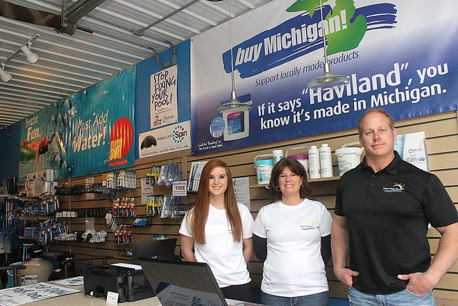 Dave and Cassie Dobson and their daughter Adrianna stand behind the counter of the families new business Perfect Pools Plus. The business carries a wide variety of pool and spa supplies. Perfect Pools Plus is located at 2980 N. Lake Wilson Road. ANDY BARRAND PHOTO