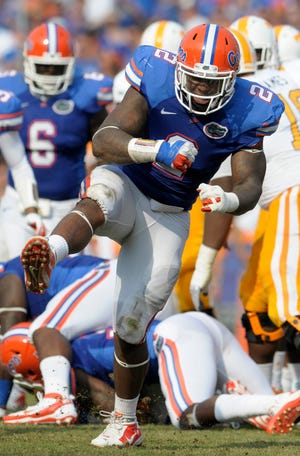 Florida defensive tackle Dominique Easley celebrates after making a tackle against Tennessee while in college. Easley was selected by the Patriots with the 29th pick in the first round of the NFL Draft on Thursday night.
