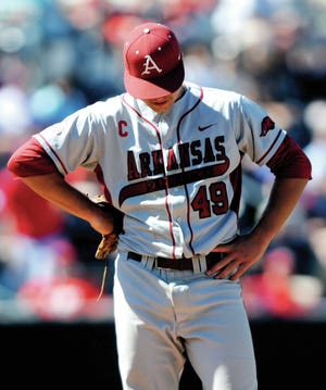 Arkansas pitcher Jalen Beeks (49) reacts to being pulled from the game afterthre and two-thirds innings with the Razorbacks trailing Mississippi 6-4 in an NCAA college baseball game at Oxford-University Stadium in Oxford, Miss., on Saturday, May 3, 2014. (AP Photo/Oxford Eagle, Bruce Newman) MAGS OUT, NO SALES, MANDATORY CREDIT