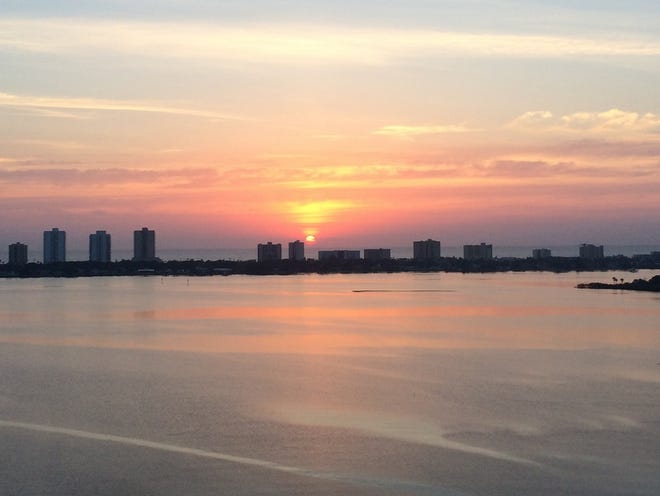 The view at sunrise over Daytona Beach Shores and the Halifax River Friday, the start of a hot, sunny weekend - with just a chance of rain on Sunday.
