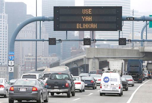 An electronic highway sign is seen on Interstate 93 in Boston, Friday, May 9, 2014. The Massachusetts Department of Transportation posted the message "Changing Lanes? Use Yah Blinkah" on the signs around the city. "Blinkah" is how Bostonians pronounce "blinker."