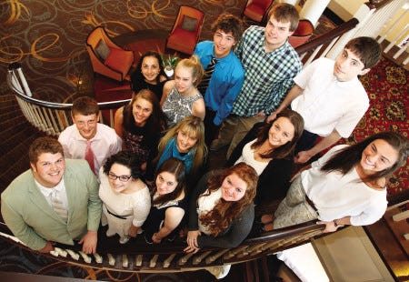 Fifteen students from Portsmouth High School gather on a staircase during a graduation ceremony from their hospitality experience at the Sheraton Portsmouth Harborside Hotel, where they have been coming since January. Pictured are, front row, from left, Connor Monaghan, Gabrielle Jones, Phoebe Smart, Sarah Rousseau and Kylie Whitehouse; middle row, from left, Brett Rice, Kaylee Pope, Haley Collins, Molly Frampton and Daniel Spezzano; back row, from left, Samantha Gutierrez, Kelsey Littlefield, Christopher Rossi and Zachary Linchey. Missing from the photo is Carol Santos.