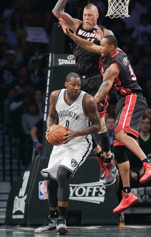 Brooklyn's Andray Blatche looks for a shot against Miami. He had 15 points and 10 rebounds Saturday.