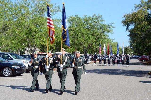 File PhotoThe Bluffton JROTC Color Guard parades at the head of the Sun City Veterans Association Color Guard and marchers.