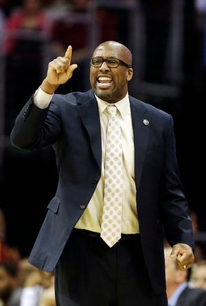 In this April 5, 2014, photo, Cleveland Cavaliers head coach Mike Brown yells at his team during an NBA basketball game against the Charlotte Bobcats in Cleveland. On Monday, May 12, 2014, the Cavaliers announced Brown has been released as head coach. THE ASSOCIATED PRESS