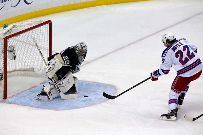 New York's Brian Boyle shoots past Pittsburgh's Marc-Andre Fleury in the first period. The Rangers won 2-1 in Game 7 to cap a comeback from a 3-1 series deficit.