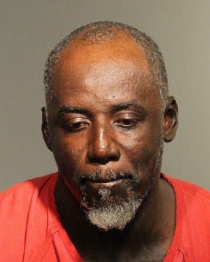 Wandack Dawkins is charged along with another man after federal agents say he was smuggling illegal Hatians and Bahamians into Ponce Inlet.