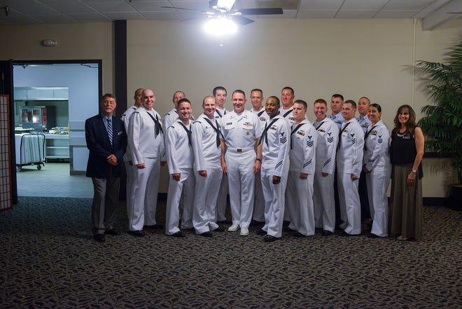 Master Chief Petty Officer of the Navy Mike Stevens poses for a photo with the 2013 Kings Bay Sailors and Coast Guardsmen of the Year during the annual sea service awards ceremony and recognition banquet hosted by the Camden-Kings Bay Council Navy League.