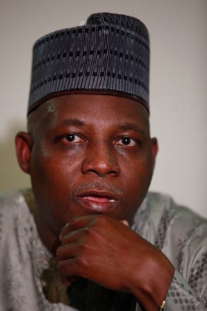 Borno state governor, Kashim Shettima, speaks to journalists during an interview in Abuja, Nigeria, Tuesday, May 13, 2014. Shettima says 54 abducted girls have been identified by parents in a Boko Haram video released Monday. A Nigerian government official said "all options are open" in efforts to rescue almost 300 abducted schoolgirls from their captors as US reconnaissance aircraft started flying over this West African country in a search effort. Boko Haram, the militant group that kidnapped the girls last month from a school in Borno state, had released a video Monday purporting to show some of the girls. (AP Photo/Sunday Alamba) 
 A vendor sell local newspapers on a street, with headlines stating we have identified 54 of the kidnapped school girls of a government secondary school Chibok, in a video released on Monday by Boko haram in Abuja, Nigeria, Wednesday, May 14, 2014. A Nigerian government official said "all options are open" in efforts to rescue almost 300 abducted schoolgirls from their captors as US reconnaissance aircraft started flying over this West African country in a search effort. Boko Haram, the militant group that kidnapped the girls last month from a school in Borno state, had released a video yesterday purporting to show some of the girls. A civic leader said representatives of the missing girls' families were set to view the video as a group later today to see if some of the girls can be identified. (AP Photo/Sunday Alamba) 
 Christians pray during a service to support the release of kidnapped girls in Nigeria, at a church in Seoul, South Korea, Wednesday, May 14, 2014. Boko Haram, the militant group that kidnapped nearly 300 schoolgirls in Nigeria, said the girls will only be freed after the government releases jailed militants. (AP Photo/Ahn Young-joon)