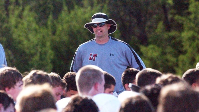 Offensive coordinator Matt Green addresses Lake Travis football players at a 2010 practice. Green, who helped the Cavaliers win three consecutive Class 4A state titles from 2008-10, has been named the lone finalist to become the next head coach at Marble Falls High. CREDIT: Max Thompson/For American-Statesman