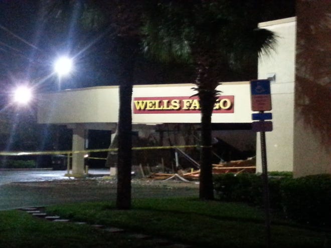 Debris covers multiple lanes at a bank drive thru in Jacksonville Thursday night.