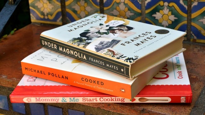 Food books hot for summer include “Under Magnolia” by Frances Mayes, “Cooked” by Michael Pollan and “Mommy & Me Start Cooking” by DK Publishers.