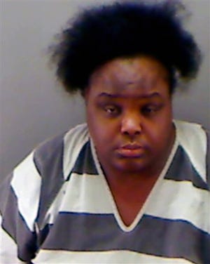 This undated booking photo provided by the Longview Police Department shows Charity Johnson. Authorities say Johnson, 34, posed as a teenager to enroll as a sophomore at a private Texas high school. (AP Photo/Longview Police Department)