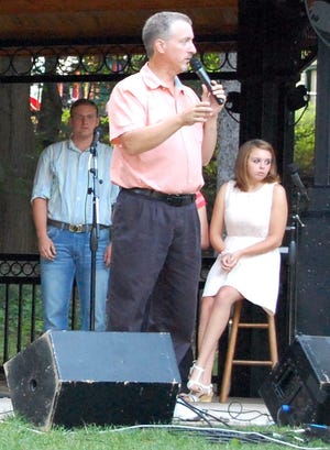 Cory Champion led the audience in singing at a Mrs. Stock's Park concert last year. FILE PHOTO