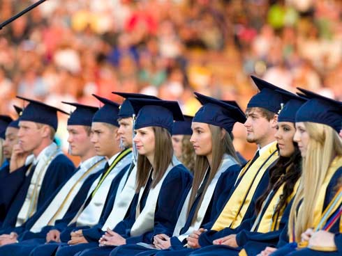 Walton High School's Class of 2014 listen to speakers during the school's commencement ceremony Friday night in DeFuniak Springs.