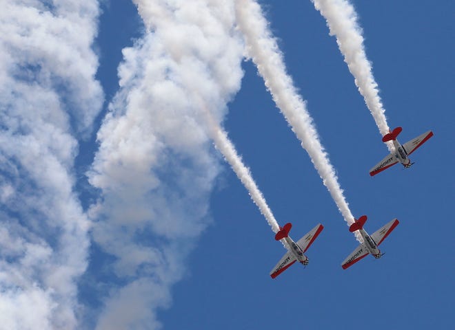 The AeroShell Aerobatic Team shows examples of old school precision flying.