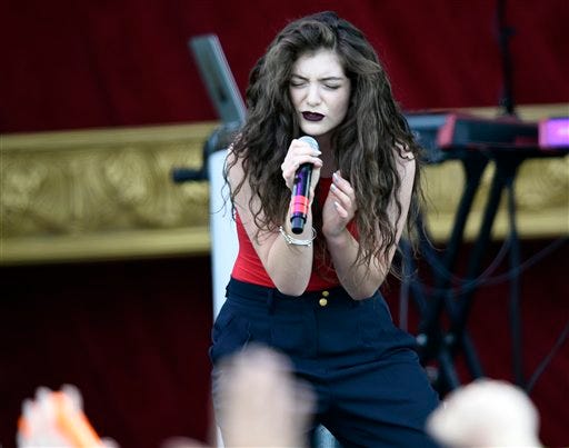 Entertainer Lorde performs before the 139th Preakness Stakes horse race at Pimlico Race Course, Saturday, May 17, 2014, in Baltimore. (AP Photo/Nick Wass)