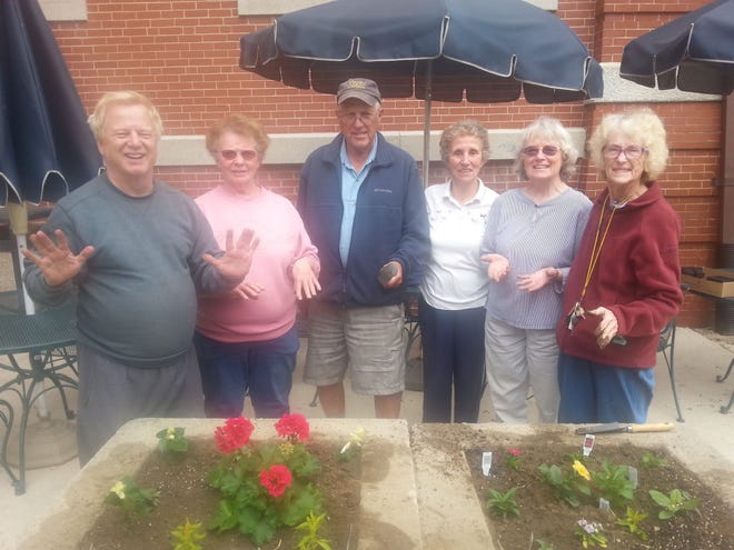 Courtesy photo

Dover Community Senior Center members show off their green thumbs after beautifying the raised flower beds outside the McConnell Center on Thursday. Pictured (from left) are Jack Dudley, Sharon Oulton, Peter Birch, Rickie Cargill, Mary Birch, and Carol McCabe. The Senior Center gratefully acknowledges Wentworth Greenhouses for supplying them with beautiful geraniums, pansies and other spring plantings again this year. The Senior Center is located at 61 Locust Street in the McConnell Center and invites all those 50-plus in the Dover area to come on in and see all the fitness, travel, fun, games and activities that we have to offer. Call 516-6436 for more information.