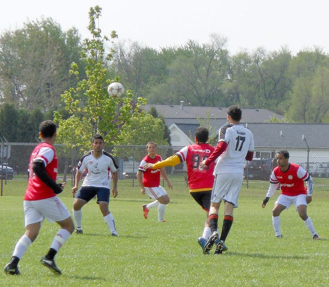 A soccer ball flies through the air during a soccer tournament. KASEY WORST PHOTO