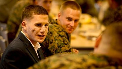 Cpl. Kyle Carpenter speaks to Marines during lunch at Bobo Chow Hall in Quantico, Va., on Nov. 8, 2013.