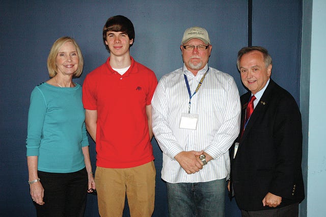The Columbia Breakfast Rotary Club awarded a scholarship to Zachary Taylor Hamilton of Hampshire Unit School. From left are adviser Beth Patton, Zachary Taylor Hamilton, Jim Odom and Jmmy Dugger, club president.