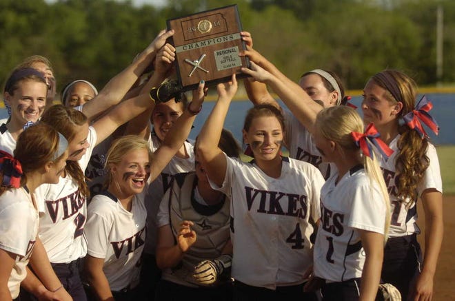 Seaman players celebrate after beating Topeka West 5-1 for the Class 5A regional title on Tuesday, keeping the Vikings undefeated on the season.