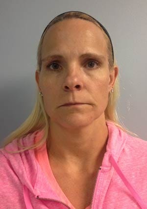 Franklin Police Photo - Michele R. Panfile, 43, of Franklin is charged with providing alcohol to two of the boys.