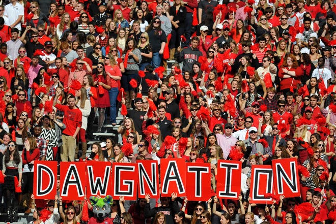 Georgia fans in the stands during the first half of the NCAA football game between Georgia and Appalachian State in Athens, Ga., Saturday, Nov. 9, 2013. (AJ Reynolds/Staff, @ajreynoldsphoto)