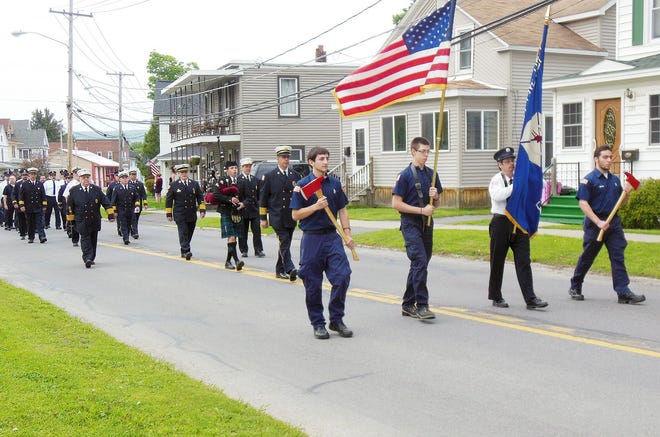Firefighters process down South Litchfield Street in Frankfort Wednesday evening for the annual Firefighters Memorial Service. TELEGRAM PHOTO/DONNA THOMPSON