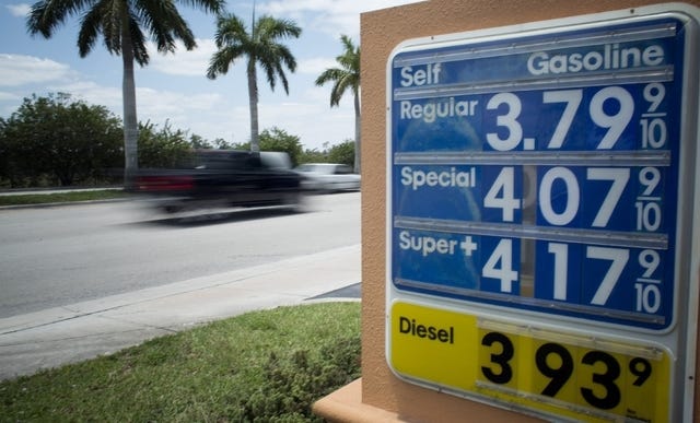 THE ASSOCIATED PRESS / Traffic moves past a Doral, Fla., gas station Wednesday. If the price of gasoline looks familiar this Memorial Day thats because it is. For the third year in a row, the national average will be within a few pennies of $3.64 per gallon. 
 ASSOCIATED PRESS FILE PHOTO / Gary Frow fuels his 32-foot Intrepid boat at the Matheson Hammock Park Marina in Miami on Wednesday. 
 ASSOCIATED PRESS FILE PHOTO / Katie Spillane of Brookline, Mass., fills her car with fuel at a gas station in Brookline on April 29.