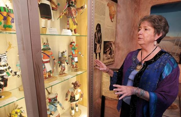 (Photo Mike Hensdill/The Gaston Gazette) The Schiele Museum celebrates the opening of the Henry Hall of the American Indian after the hall was renovated. Here, President and Director Ann Tippett shows off some Kachina Dolls showcased in the Henry Hall Thursday afternoon, May 22, 2014.