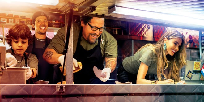 Emjay Anthony, left, John Leguizamo, Jon Favreau and Sofia Vergara behind the counter of the food truck in "Chef."
