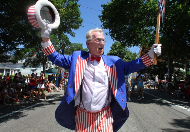 Uncle Sam Rounseville (that's his legal name), of Quincy, Mass., marches in the Bristol Fourth of July Parade.