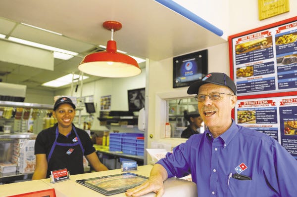 Nelson Hockert-Lotz, owner of two New Bedford Domino's Pizza stores, says his roots in community services trace back to his mother. Raised in Vermont, he's been in business in the SouthCoast for 30 years.