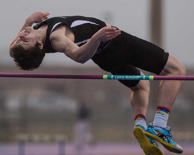 Topeka High's Joel Long finshes first in the high jump with a leap of 6-8 during a Class 6A regional Friday at Free State. He also finished second in the long jump.