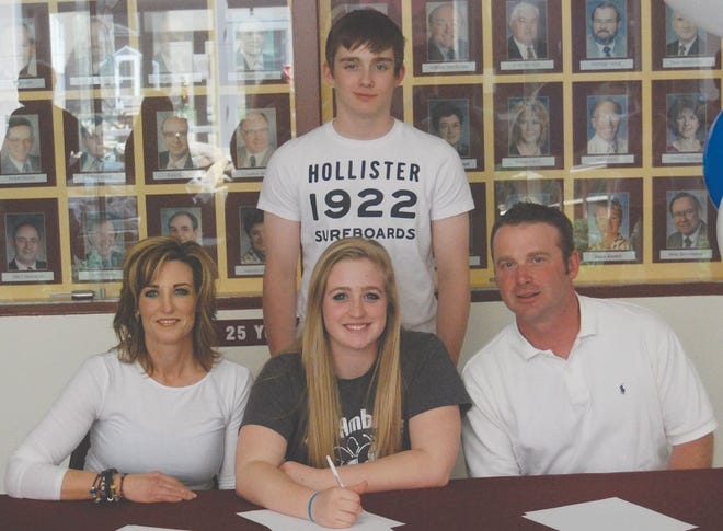 Recent East Peoria Community High School graduate Jaycie Stealy, middle, signed May 6 with St. Ambrose University, where she will play women's basketball for the Fighting Bees. With Stealy in the auditorium foyer were, from left: her mother, Russet Stealy, brother, Jarrot Stealy, and father, Buck Stealy.
