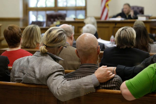In this April 17, 2014 file photo, spectators watch proceedings in Circuit Judge Chris Piazza's courtroom at the Pulaski County Court House in Little Rock. Piazza, struck down Arkansas' ban on gay marriages on May 9. (AP Photo/Danny Johnston, File) 
 In this May 20, 2014, file photo, from right, Viola Vetterm and her wife, Kate Potalivo, and Amber Orion and her partner, Joy Payton, listen to a speaker during a rally at City Hall in Philadelphia. Pennsylvania's ban on gay marriage was overturned by U.S. District Judge John E. Jones III on May 20. (AP Photo/Matt Slocum, File) 
 In this July 1, 2013 file photo, Rick Nelson Flor, right, holds a flower bouquet as he stands next to his partner, Robert O'Rourke, before their wedding ceremony in West Hollywood, Calif. (AP Photo/Jae C. Hong, File) 
 William Roletter, left, and Paul Rowe, press close to one another as they apply for their marriage certificate Wednesday, May 21, 2014, at City Hall in Philadelphia. On Tuesday, Pennsylvania became the final Northeastern state and the 19th in the U.S. to legalize same-sex marriage. Republican Gov. Tom Corbett said Wednesday he would not appeal a federal judge's ruling that overturned the state's 1996 ban. (AP Photo/Matt Rourke)