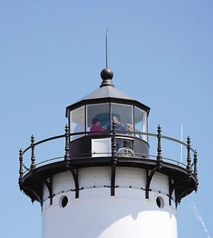 Visitors line up for a chance to climb to the lantern room of the Portsmouth Harbor Lighthouse during Sunday's open house.