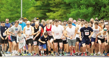 Amy Root-Donle photo
Runners leave the starting line at Sunday’s Redhook/Runner’s Alley 5K road race in Portsmouth. More than 2,000 runners finished the event, part of the Seacoast Road Race Series.