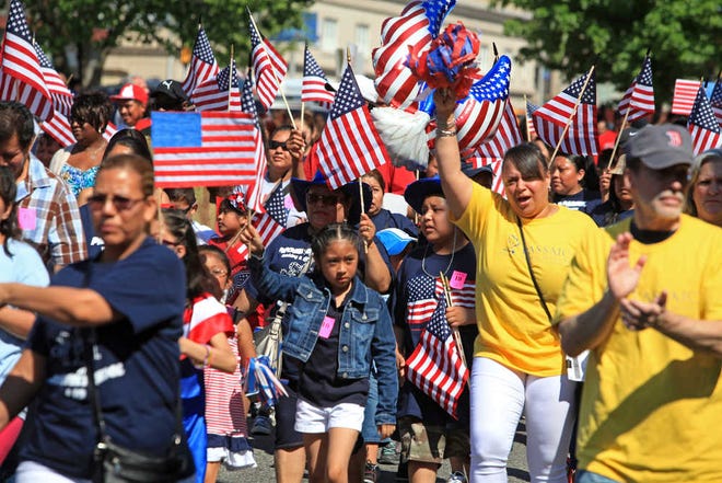 Students, family and faculty of the Roosevelt School march down Main Avenue in Passaic, N.J., on Monday during the Passaic Memorial Day Parade.Chris Pedota/The Record of Bergen County