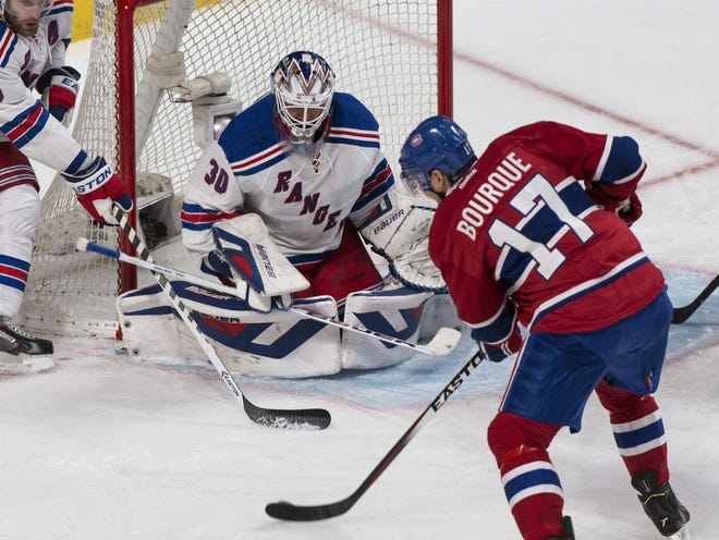 Montreal forward Rene Bourque (17) scored three goals as the Canadiens stayed alive in the Eastern Conference finals.