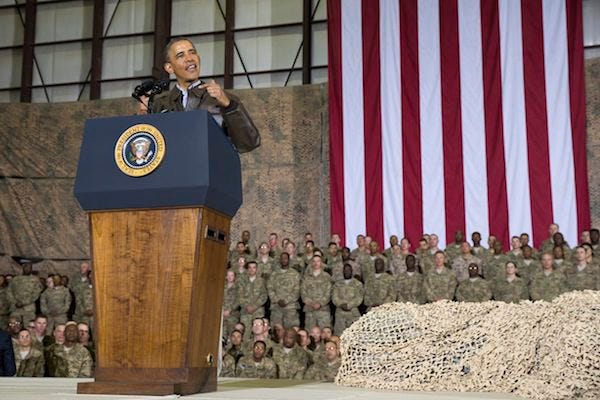 This May 25, 2014, file photo shows President Barack Obama speaking during a troop rally after arriving at Bagram Air Field for an unannounced visit, north of Kabul, Afghanistan. Senior U.S. administration officials say President Barack Obama will seek to keep 9,800 U.S. troops in Afghanistan after the war formally ends later this year. Nearly all of those forces are to be out by the end of 2016, as Obama finishes his second term. THE ASSOCIATED PRESS