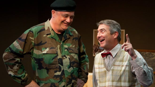 Michael Stuart, left, and David Stahl star in “The Foreigner” at Austin Playhouse through June 22.
